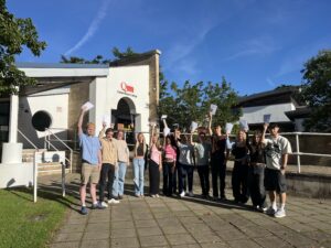 Queen Mary's College students celebrating excellent results on A Level Results Day 2024